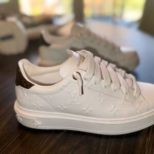 Louis Vuitton Time Out Sneaker worn once. Perfect shape. Size 8 (38) w/ receipt